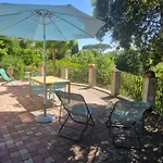 Апартаменты With Garden In *